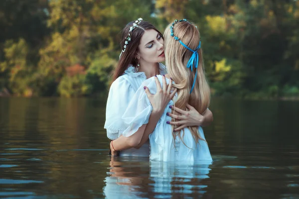 Mistresses women embracing. — Stock Photo, Image