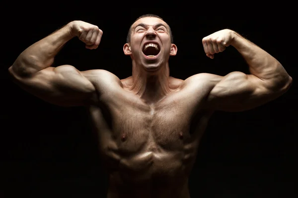 Portræt af en bodybuilder, der græder . - Stock-foto