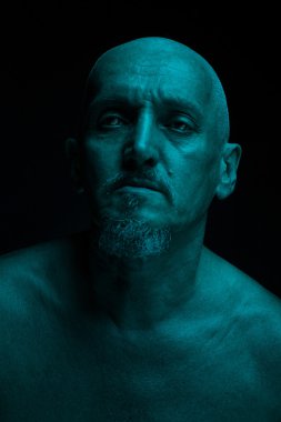 Horrible man with a beard.