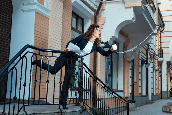 Woman ran out of the office and spilled water. — Stock Photo, Image