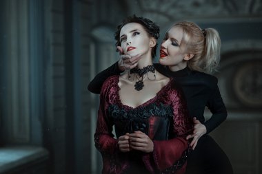 Woman vampire bites. clipart