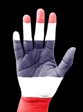 Tayland bayrak el üstünde siyah bir arka plan ile.