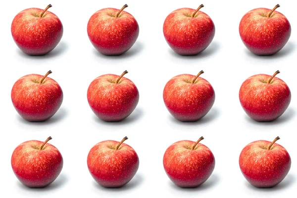 Red apple on a white background. Pattern. Sweet delicious fruit. — Stock Photo, Image