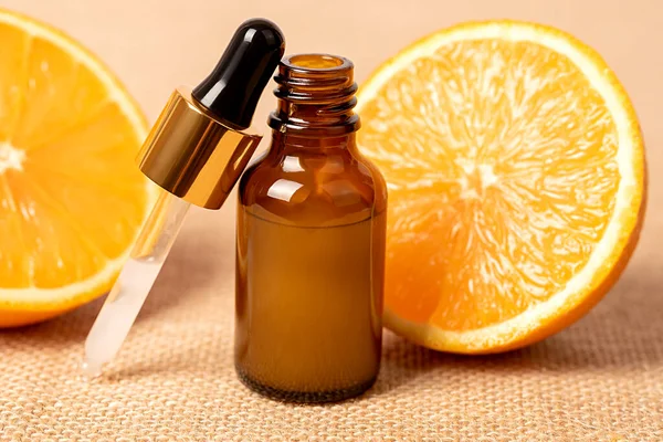 化粧品油。ボディローション。果物だ。オレンジだ。果物だ。代替医療。スキンケア. — ストック写真