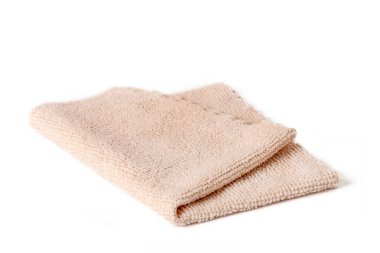 Temizlik için bej mikrofiber kumaş. Ev işleri ve ofis işleri..
