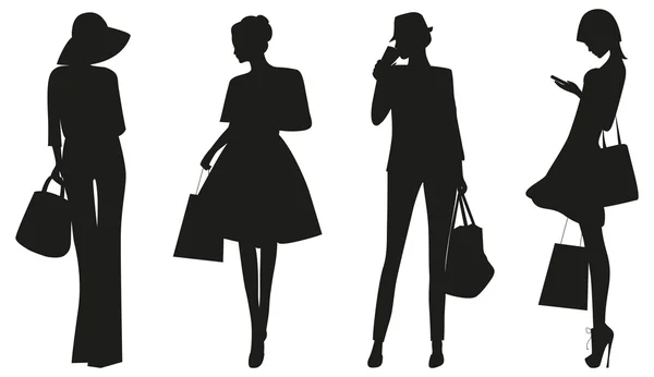 Silhouettes de femmes de mode . — Image vectorielle