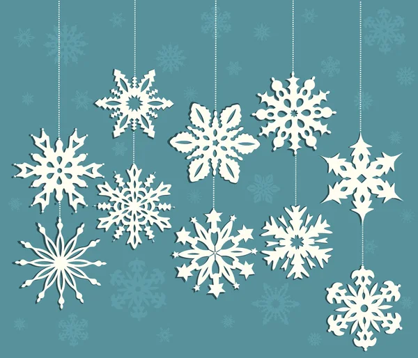 White snowflakes on blue background — Stock Vector