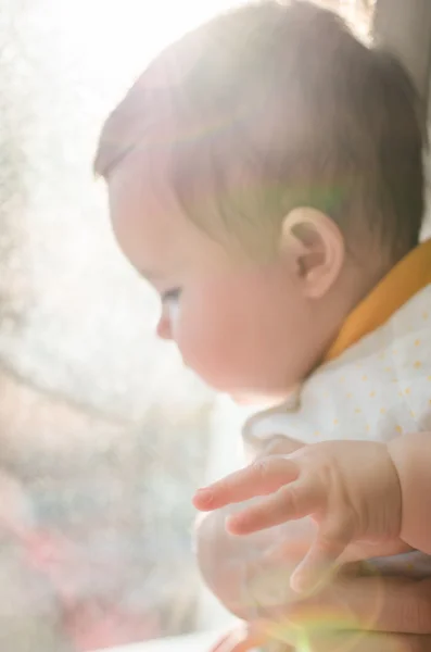 Portrait of cute caucasian little baby girl in backlight — Stock Photo, Image