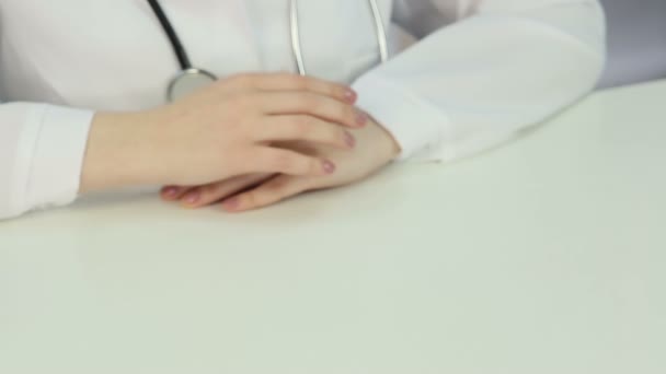 Pharmaceutical sales representative shaking female doctor's hand, making a deal — Stock Video