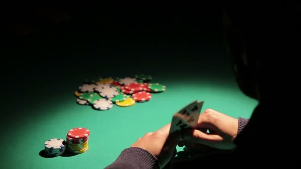 Male gambling addict playing poker at illegal casino, taking risk to lose money — Stock Video