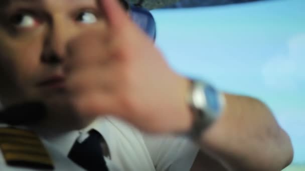 Responsible pilot making thumbs up sign after checking readiness for flight — Stock Video