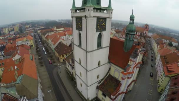 Aerial view of nice old clock on gothic city hall tower, fast motion effect — Stock Video