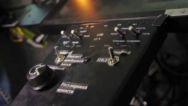 Closeup of aircraft flight control system, pilot's hand switching panel buttons — Stock Video