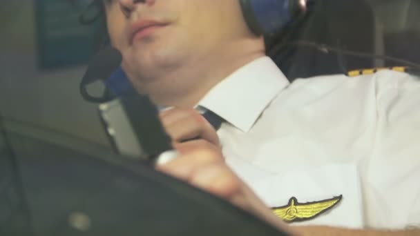 Sleepy tired aviator controlling airplane, overworked man, stressful job — Stock Video