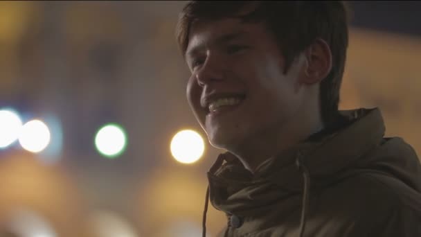 Happy smile on young man's cheerful face, guy having fun, talking to friends — Stock Video