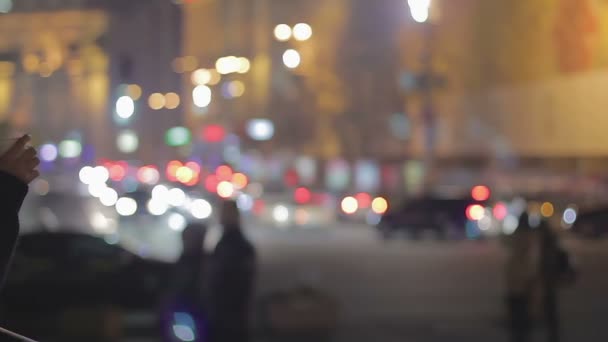 Mournful girl standing alone on street, drinking tea and thinking about someone — Stock Video