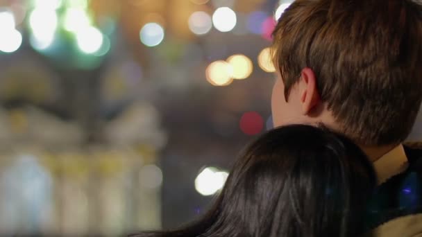 Couple in love enjoying view on beautiful night city, romance, togetherness — Stock Video