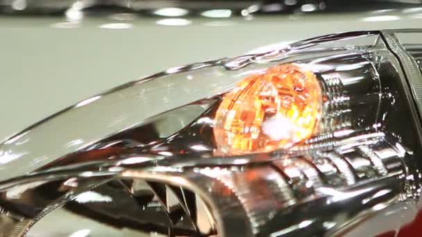 Headlamp of new auto blinking at showroom, warning light signal, car crash — Stockvideo