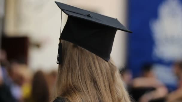 Young smart woman graduating from college, higher education, successful future — Stock Video