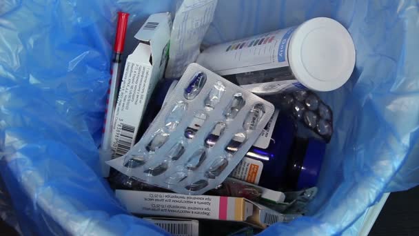 Throwing empty medicine packings trash — Stock Video