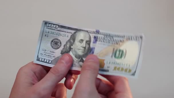 Dollar in der Hand — Stockvideo