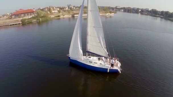 Sailing yacht on river — Stock Video