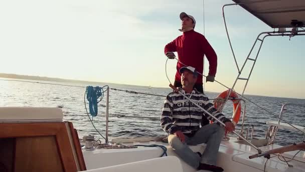 Father and son on yacht — Stock Video