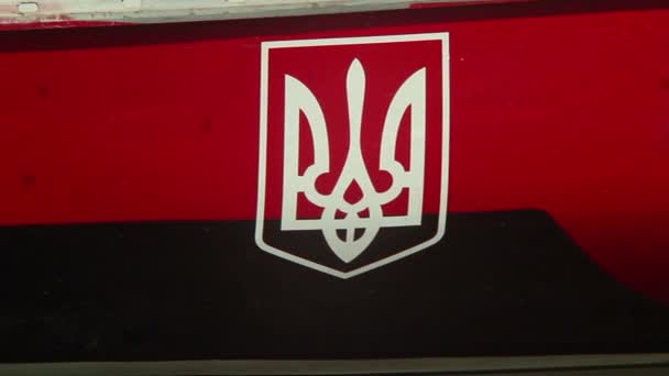 Ukrainian coat of arms on board of ship — Stock Video