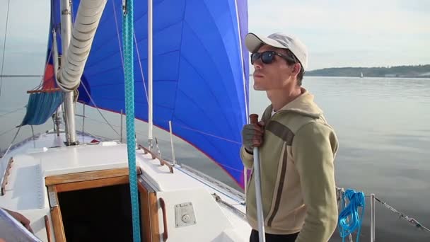 Man on sailing yacht — Stock Video
