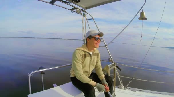 Smiling guy on yacht — Stock Video