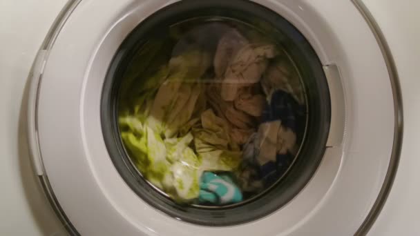 Laundry machine washing clothes, housewife's everyday life — Stock Video
