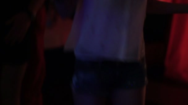 Sexy young woman legs dancing at club, provoking behavior glamor — Stock Video