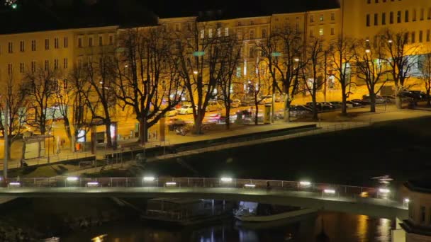 Time lapse of big old European city nightlife, establishing shot — ストック動画