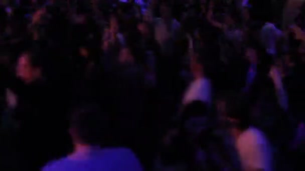 Wild crowd enjoying music, ecstasy dancing, going crazy in club — Stock Video