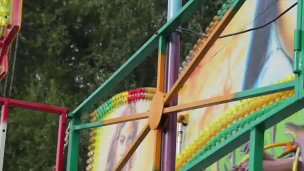 Dangerous carousel moving around, people having fun, enjoying festival, emotions — Stock Video