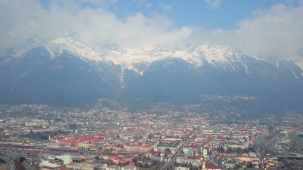 Winter panorama of beautiful European city and mountains covered with snow — Stock Video