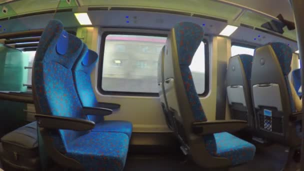 Economy class train with many empty seats moving, no passengers travel, crisis — Stock Video