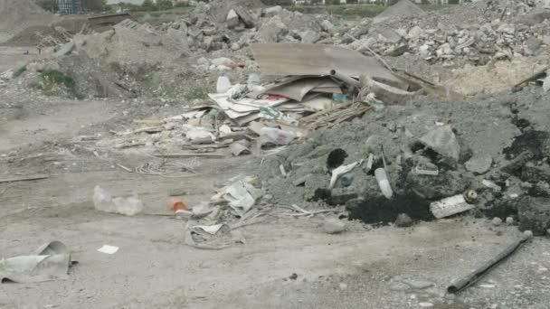 Panorama view of neglected landfill site. Tones of waste contaminating nature — Stock Video