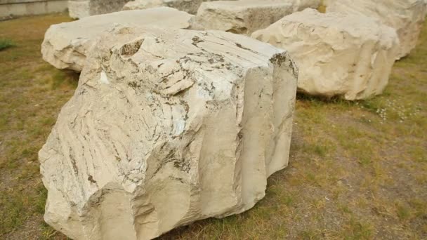 Pieces of stone, ancient marble construction ruins in excavation area, history — Stock Video