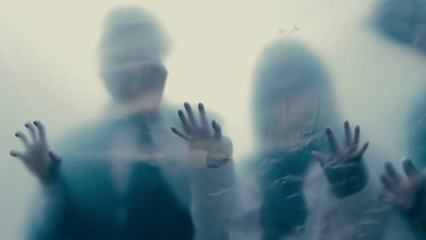 Human silhouettes behind transparent film, isolated infected people, lost souls — Stock Video