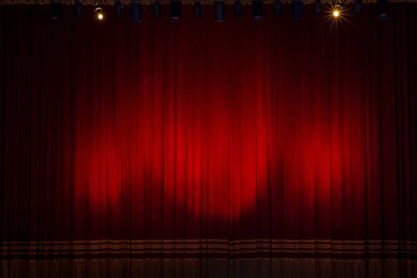 Theater curtain lit, curtain closed