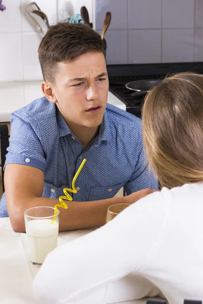 Teenage couple having argument indoors — Stock Photo, Image