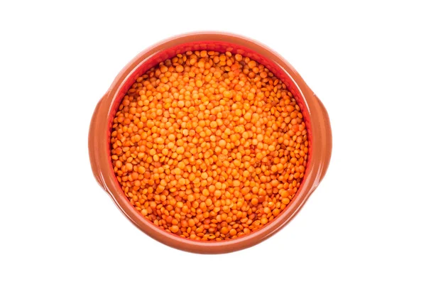 Ceramic bowl with orange lentil — Stock Photo, Image