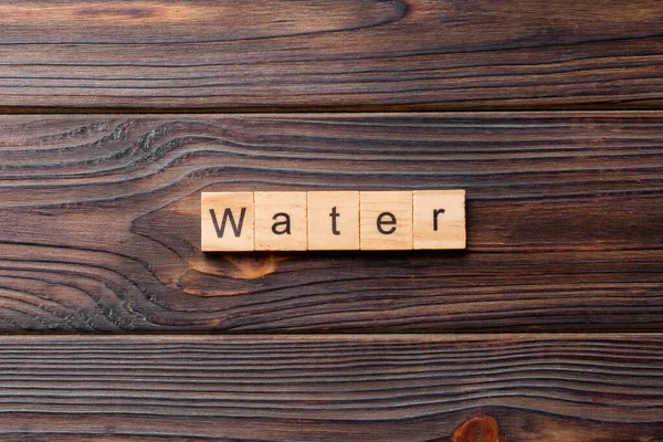 Wasserwort Auf Holzblock Geschrieben Wassertext Auf Zementtisch Für Ihre Gestaltung — Stockfoto