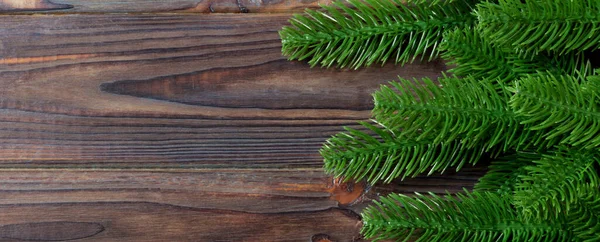 Bovenaanzicht Banner Van Frame Gemaakt Van Dennenboomtakken Houten Ondergrond Kerstconcept — Stockfoto