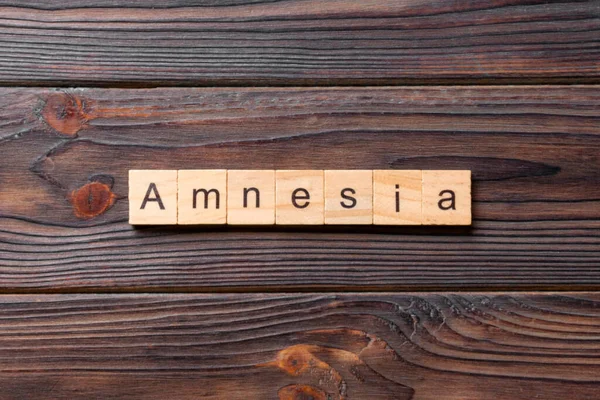 Amnesie Wort Auf Holzblock Geschrieben Amnesie Text Auf Dem Tisch — Stockfoto