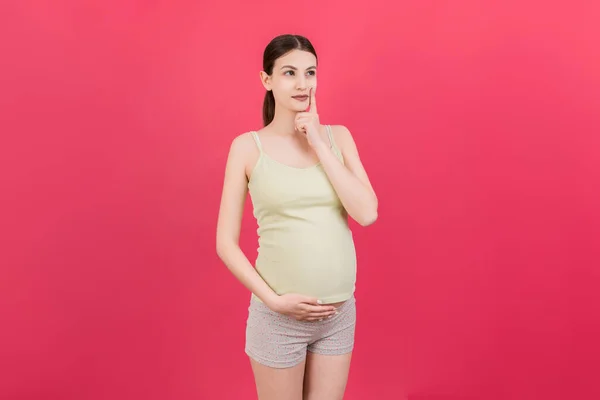 Pensive Pregnant Woman Choosing Name Baby Colored Background Dream Happy — Stock Photo, Image