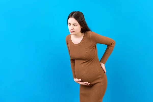 Έγκυος Γυναίκα Πόνο Στην Πλάτη Έγχρωμο Φόντο Απομονωμένη — Φωτογραφία Αρχείου