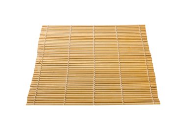 İzole edilmiş yemek örtüsü perspektifi. Bambu hasırını kapatın Tasarımınız için boş boşluk.