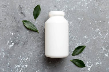 İlaçlar, ilaç şişesi, sağlık ve tıbbi destek. Vitamin hapları. Yeşil yapraklı vitaminler, doğal organik biyo takviyeler, fotokopi alanı..